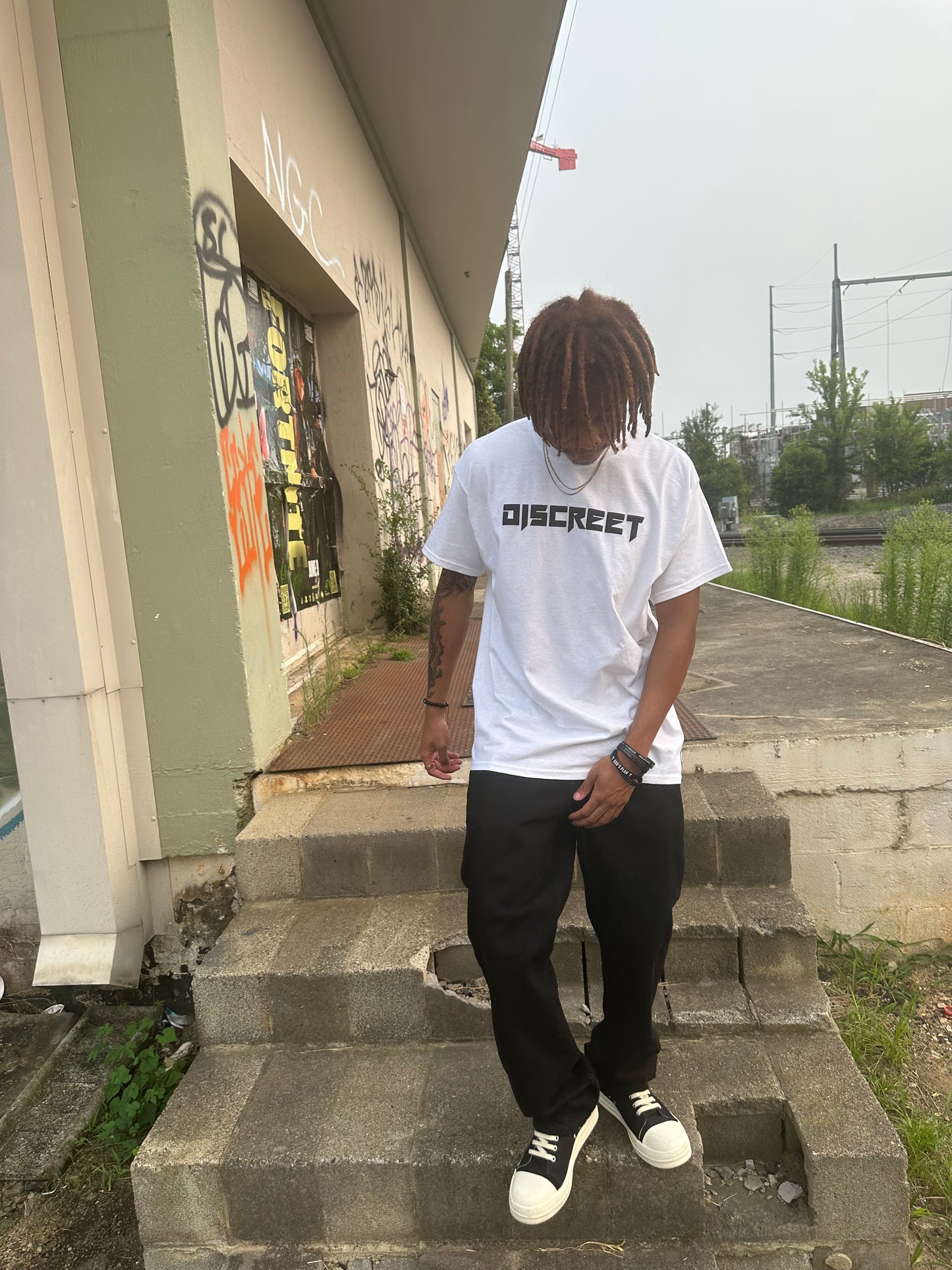 Discreet Alternate Black on White Tee